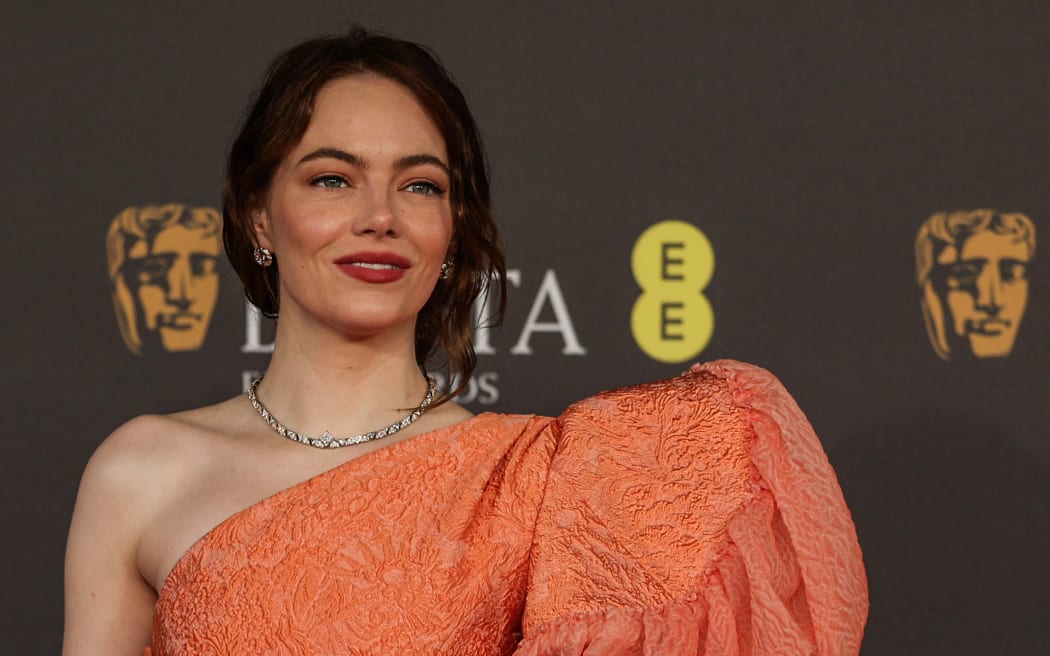 US actress Emma Stone poses on the red carpet upon arrival at the BAFTA British Academy Film Awards at the Royal Festival Hall, Southbank Centre, in London, on February 18, 2024.