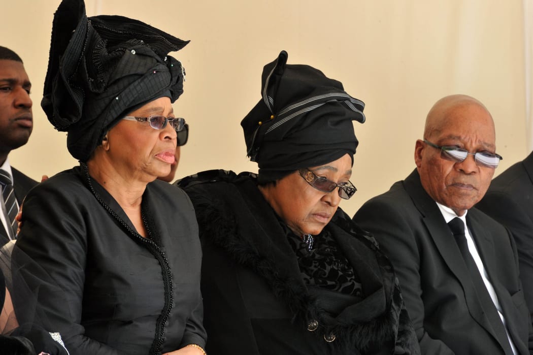 Graca Machel (left), Winnie Madikizela-Mandela and President Jacob Zuma.