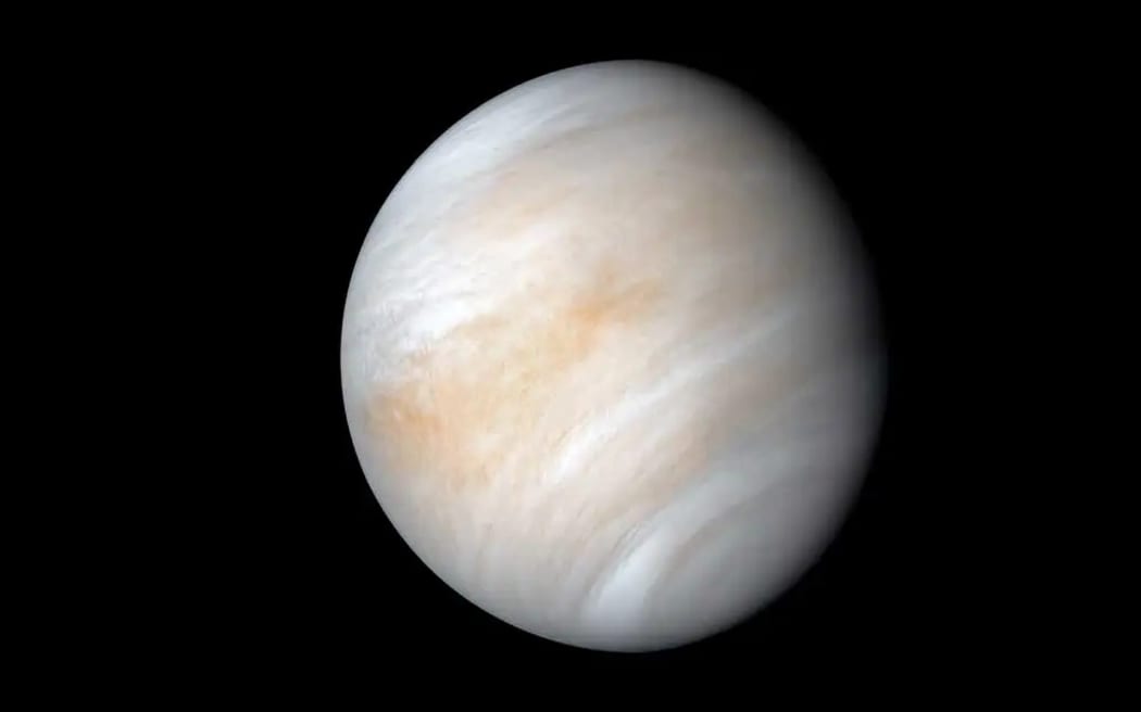 Contrary to its serene appearance, the clouded globe of Venus is a world of intense heat, crushing atmospheric pressure and clouds of corrosive acid.