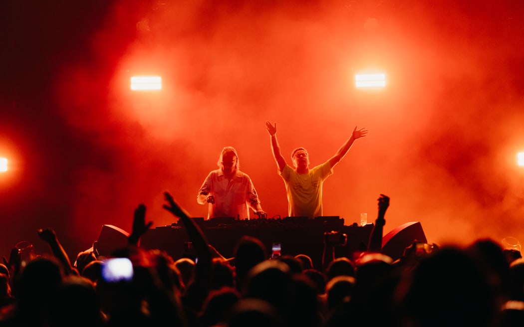 Basement Jaxx’s Felix Buxton (right) acknowledges fans at the duo's concert at Christchurch's Te Pae convention centre on Thursday, 30 March, 2023.