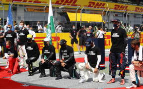 F1 drivers take a knee on the grid in support of the Black Lives Matter movement, 2020.