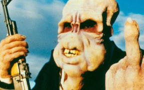 Detail from a promotional poster for the 1987 comedy horror film 'Bad Taste'