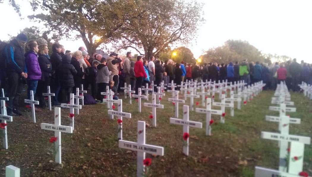 A tribute of crosses at Cranmer Square, Christchurch.