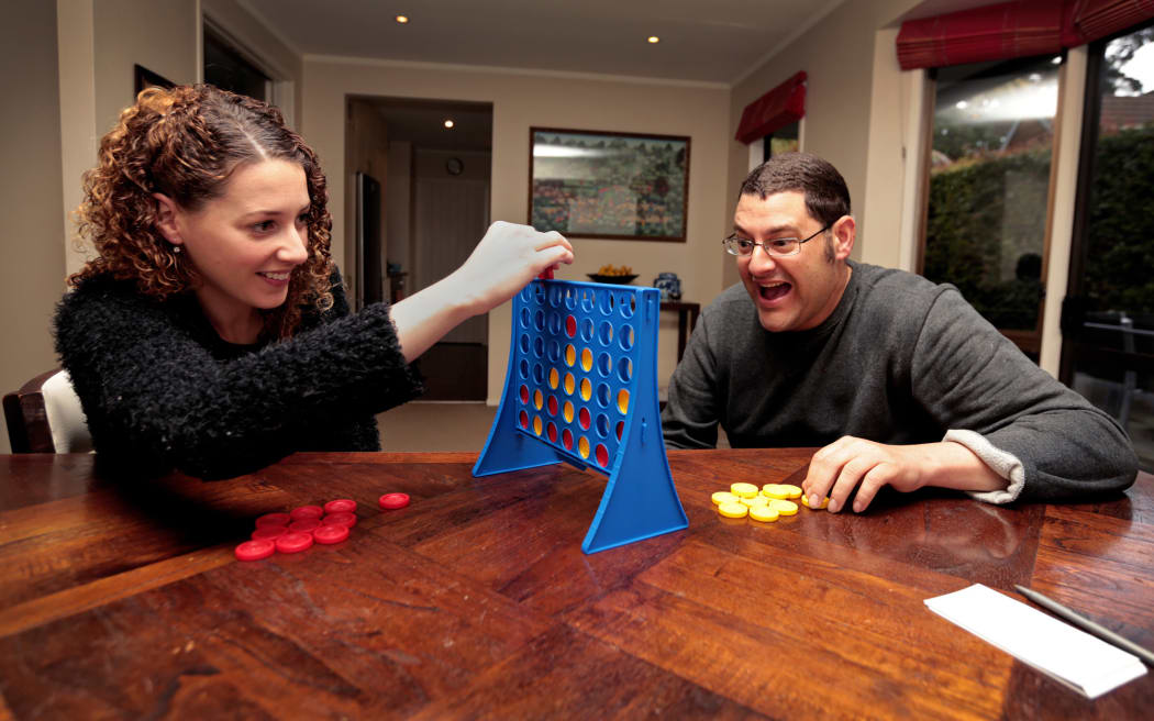 Lauren Donnan and her brother Beefy play games together.