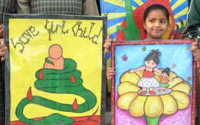 Girls participate in a protest against female foeticide, a practice that activists say is still rampant in India.