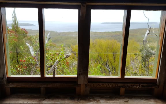 View of Port Ross from the window of the Coastwatcher's lookout at Ranui Cove