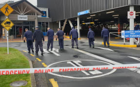 Police teams search through an area near the Chartwell Mall in Hamilton after reports of possible homemade explosives on 6 August, 2020.