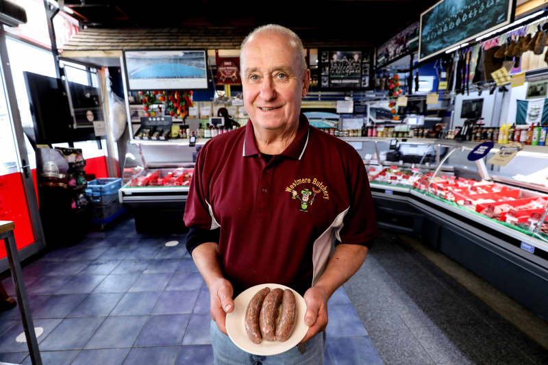 Westmere Butchery owner David Rossiter with his 2025 winning sausage.