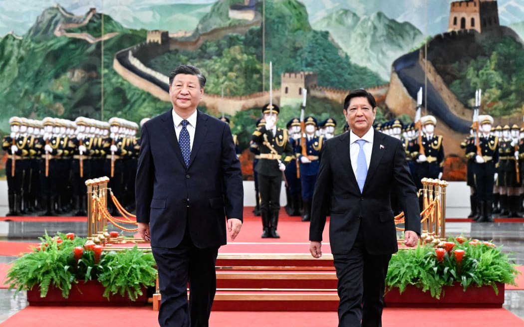 (230104) -- BEIJING, Jan. 4, 2023 (Xinhua) -- Chinese President Xi Jinping holds a welcoming ceremony for Philippine President Ferdinand Romualdez Marcos Jr. prior to their talks at the Great Hall of the People in Beijing, capital of China, Jan. 4, 2023. (Xinhua/Shen Hong) (Photo by Shen Hong / XINHUA / Xinhua via AFP)
