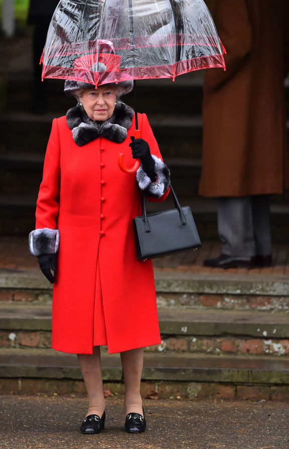 This file photo taken on December 25, 2015 shows Britain's Queen Elizabeth II attending a traditional Christmas Day Church Service at Sandringham in eastern England.