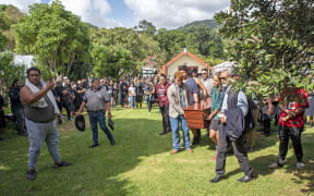 Te Kahautu Maxwell leads the funeral service at Maraenui Marae yesterday.