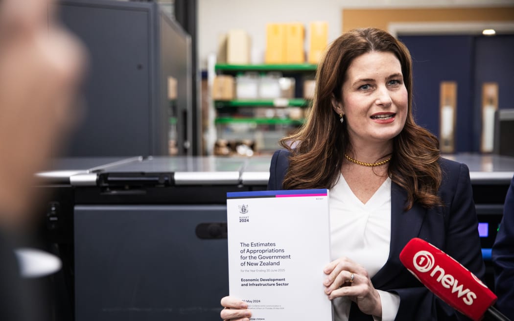 Nicola Willis reveals the cover of Budget 2024