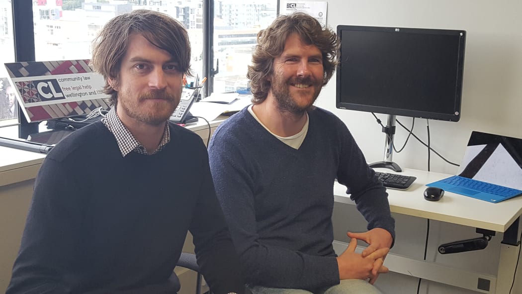 Matt Bartlett (left) led technical development of Wagbot, and the general manger of Community Law Wellington, Geoffrey Roberts.