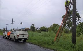 Linesmen repair damage caused by Cyclone Tino