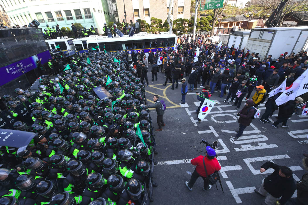 South Korean supporters of Park Geun-Hye clash with police after the announcement of the Constitutional Court over the impeachment of South Korea's President Park Geun-Hye.
