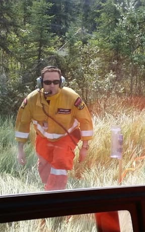 An Otago firefighter in the thick of it in Canada.