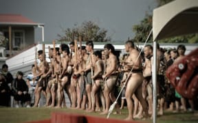 A kapa haka group performs as part of a pōwhiri at Maungapōhatu.