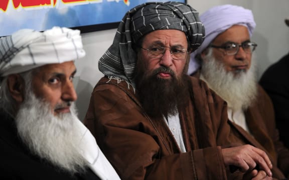 Taliban delegation members waiting to meet government negotiators in Islamabad.