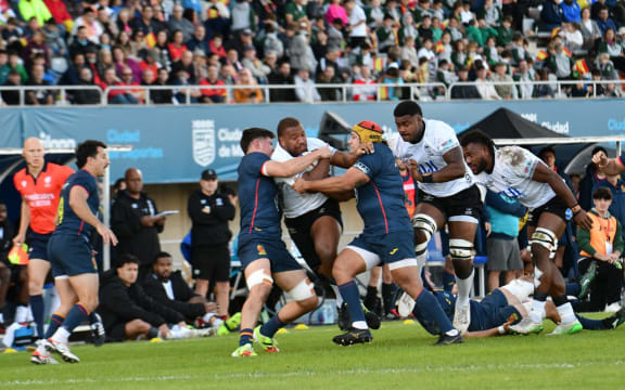 Flying Fijians captain Tevita Ikanivere take on the Spanish in their test. Fiji won.