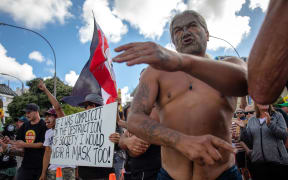 Protestors and Police standoff as police move concrete barricades