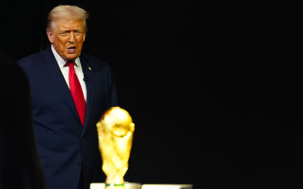 US President Donald Trump and the FIFA World Cup trophy.