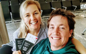 Alexa Cook and her partner ready to leave to fly to NZ.