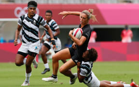 Black Fern Sarah Hirini with the ball, in the womens sevens semi-final against Fiji earlier today.