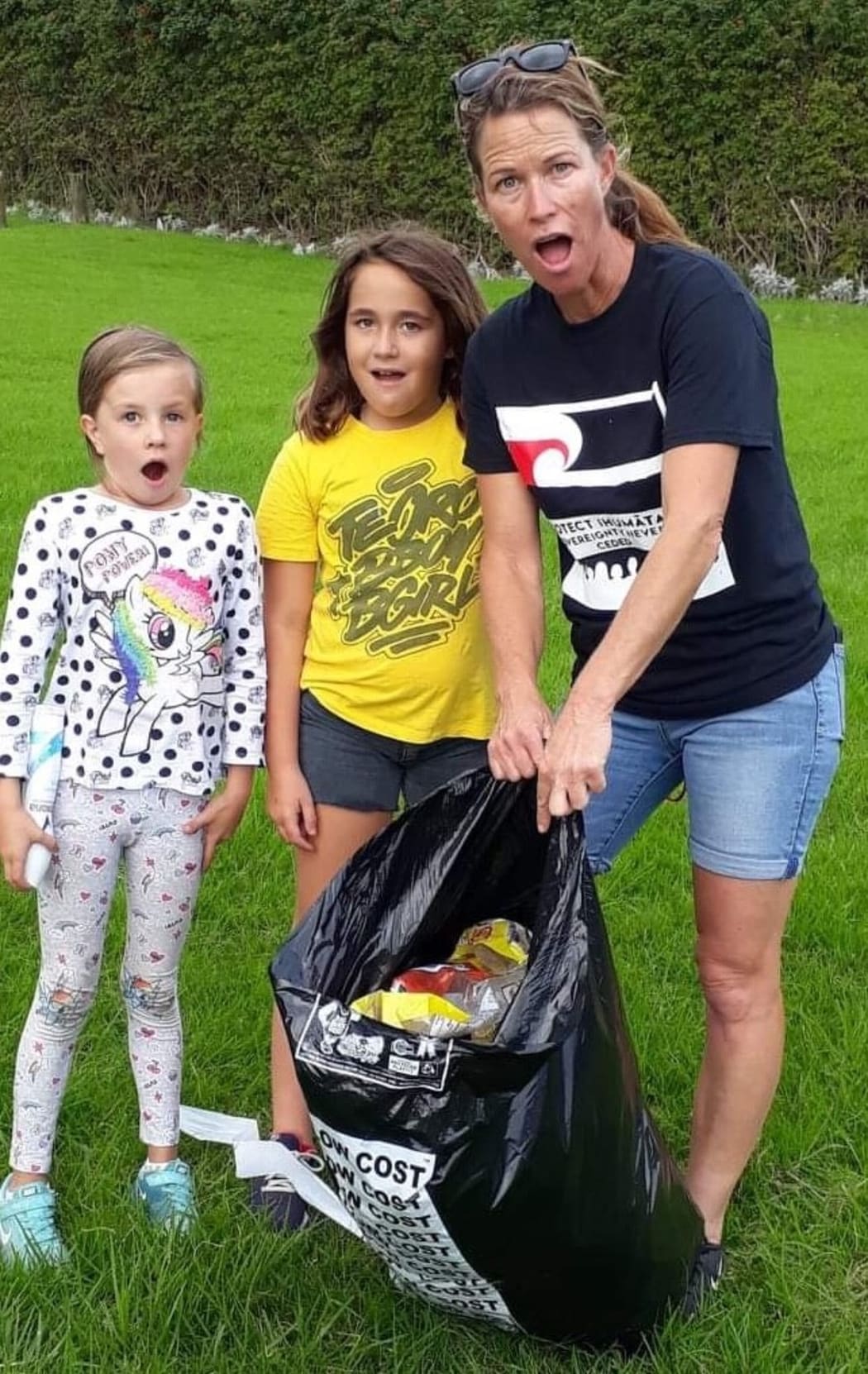 Janine Nillesen and fellow volunteers at a street clean-up event in Māngere Bridge