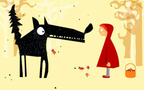 a wolf and Little Red Riding Hood eye each other in a forest.