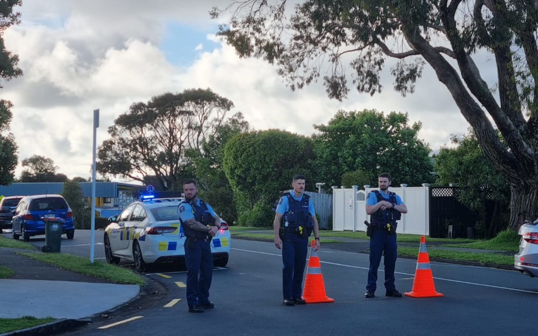 Police at the corner of Sartors and woodridge Ave in Browns bay.