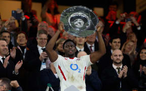 Maro Itoje of England lifts the Hilary Shield. England v All Blacks at Twickenham Stadium, 2025.