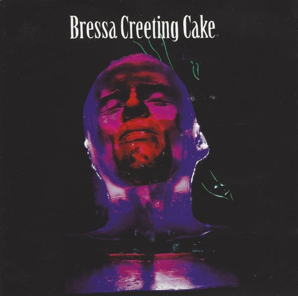 The album cover of Bressa Creeting Cake shows an illustration in red and purple of a tortured looking head without hair.