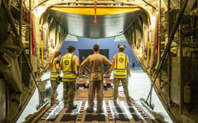 40SQN C-130J Hercules arrives in the Middle East as part of Op Kokako. RNZAF Air movement team unloads freight from the aircraft in the late hours of 25 June 2025.