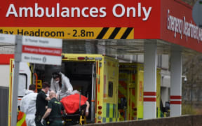 A patient arrives at St Thomas's Hospital.