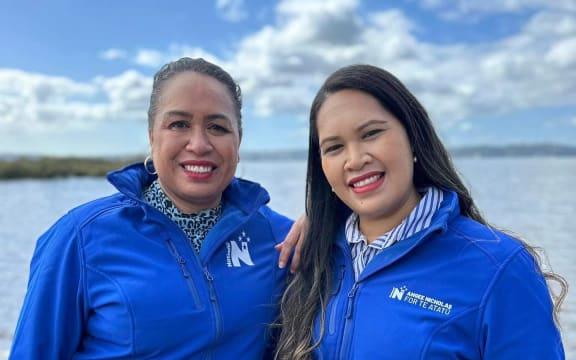 Angee Nicholas (standing right) with fellow National party member Fonoti Agnes Loheni