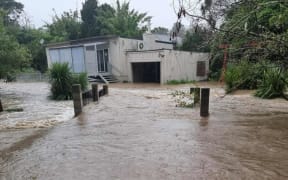 Flooding on Candia Road in Swanson, Waitakere City on 9 May 2023.