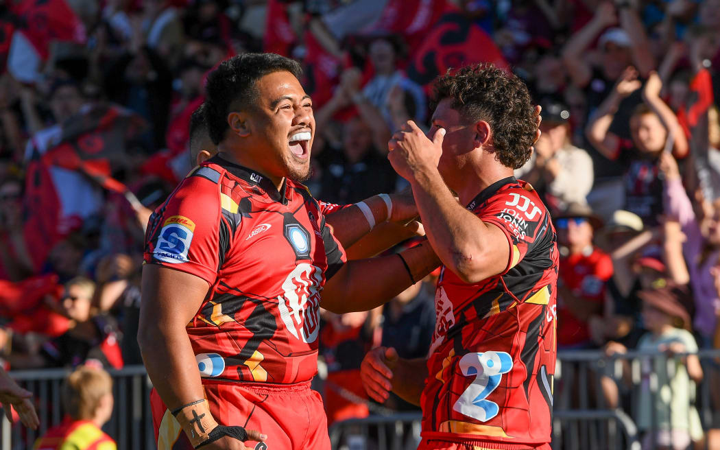 Ioane Moananu and Levi Aumua of the Crusaders celebrate.