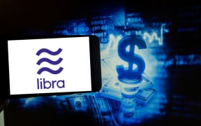 The logo of the digital currency Libra is seen in this photo illustration on the Digital Currencies. Libra is a crypto currency launched by Facebook. (Photo by Alexander Pohl/NurPhoto)