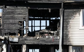 One person has died after a fire at a housing block at Burnham military camp, just outside of Christchurch.