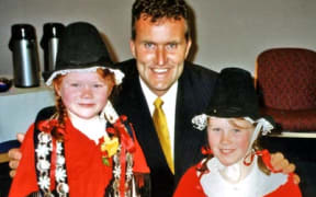 Angharad and Gwenda Whelan, daughters of Sue Whelan with the mayor of New Plymouth at the national cymanfa ganu in 2002