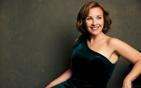 Sasha Cooke in a green dress.