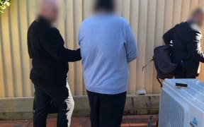 A 23-year-old Sydney man has been charged by federal police in Australia with sexually exploiting a young New Zealand girl he groomed through social media.