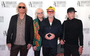 NEW YORK, NEW YORK - JUNE 13: (L-R) Peter Buck, Mike Mills, Michael Stipe and Bill Berry, of R.E.M., attend the 2024 Songwriters Hall of Fame Induction and Awards Gala at New York Marriott Marquis Hotel on June 13, 2024 in New York City.   Bennett Raglin/Getty Images for Songwriters Hall Of Fame/AFP (Photo by Bennett Raglin / GETTY IMAGES NORTH AMERICA / Getty Images via AFP)