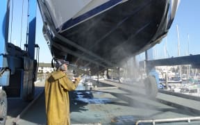 A vessel is hauled at the Nelson Marina for regular anti-foul treatment on its hull.
