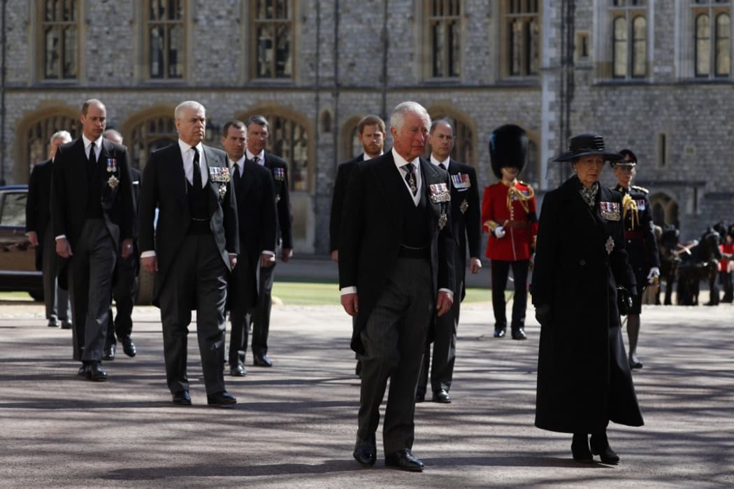 Prince Charles, left, and Princess Anne lead the ceremonial funeral procession.