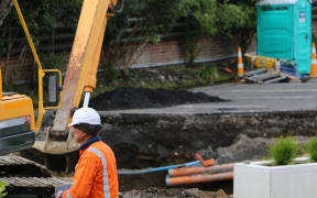 A main sewer line collapsed in Auckland, leaving a massive sinkhole 13 metres deep on a private property on St Georges Bay Road, Parnell, Auckland. 27 September 2023.