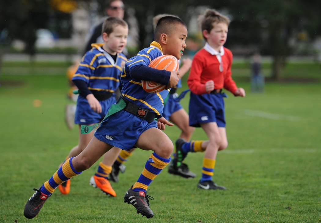 Children play a school rugby game