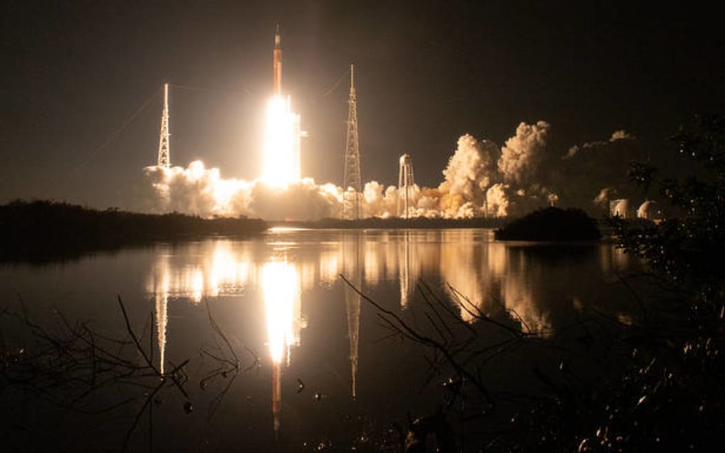 NASA’s Space Launch System rocket carrying the Orion spacecraft launches on the Artemis I flight test, Wednesday, Nov. 16, 2022, from Launch Complex 39B at NASA’s Kennedy Space Center in Florida. NASA’s Artemis 1:47 a.m. EST mission is the first integrated flight test of the agency’s deep space exploration systems: the Orion spacecraft, Space Launch System (SLS) rocket, and ground systems. SLS and Orion launched at 1:47 a.m. EST, from Launch Pad 39B at the Kennedy Space Center. Photo Credit: (NASA/Bill Ingalls)