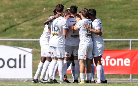 Team Wellington celebrate a goal.