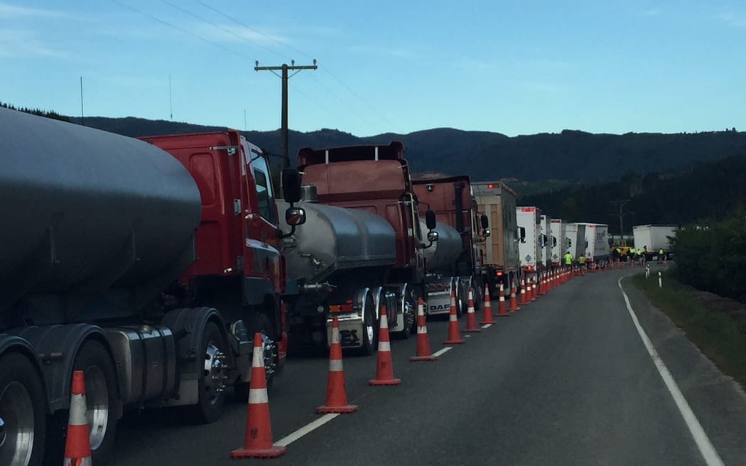A convoy waiting to to head over the Takaka Hill this morning.